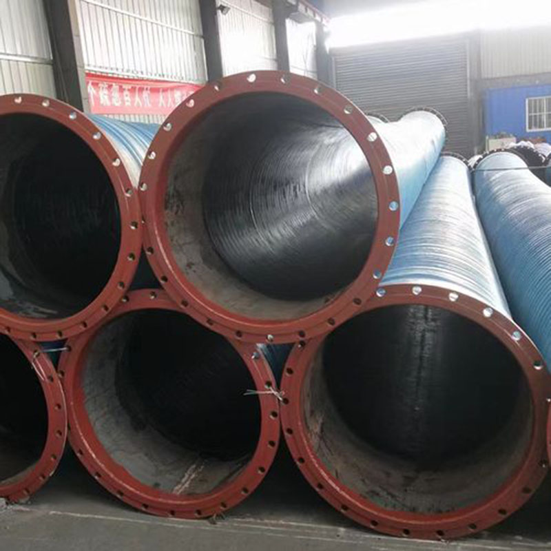 Como as mangueiras de grande diâmetro são aplicadas em sistemas industriais de alto fluxo?